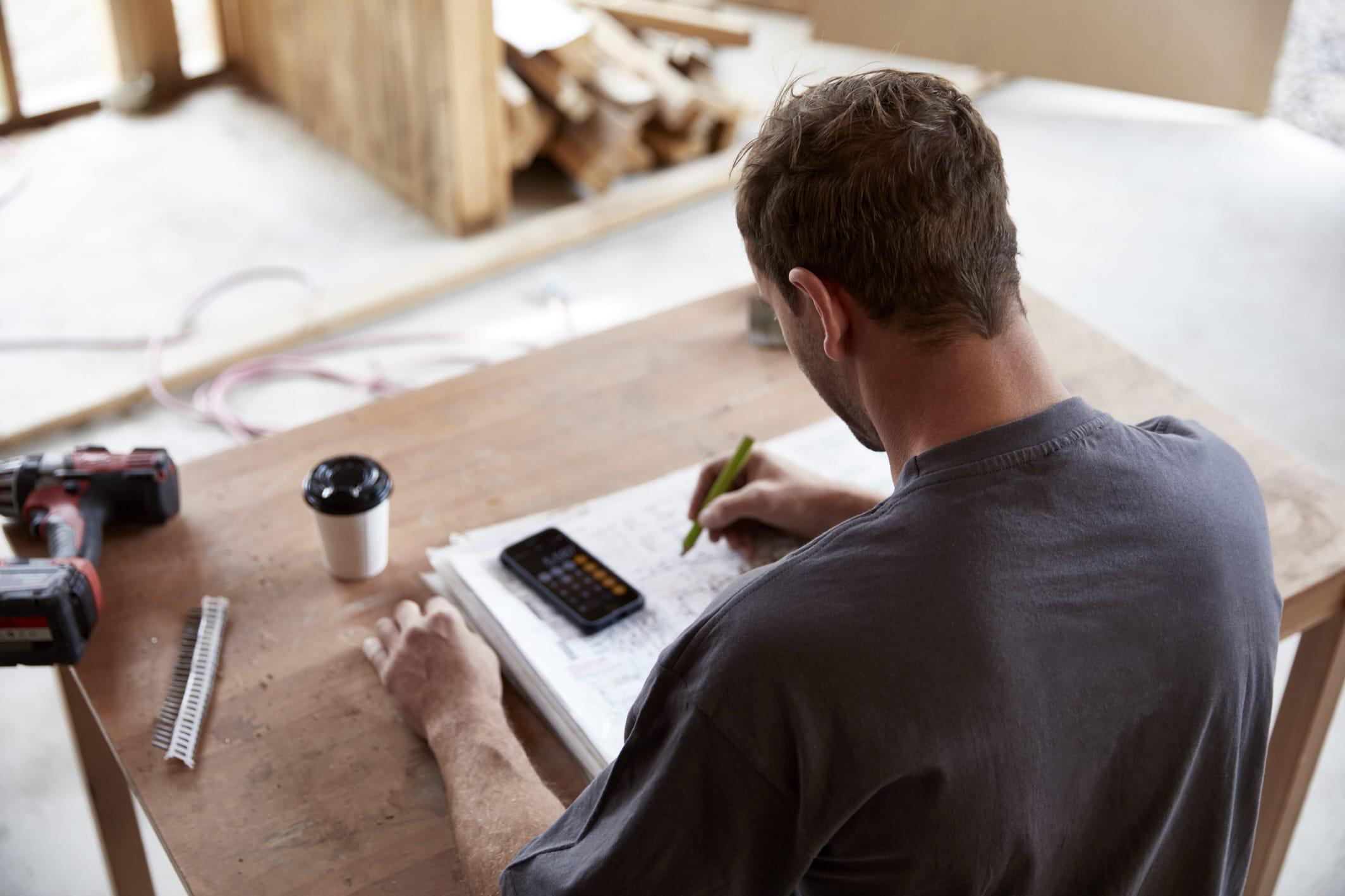 A man calculating something